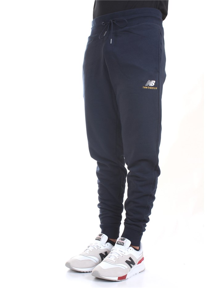 NEW BALANCE MP11590 Blue Clothing Man Trousers