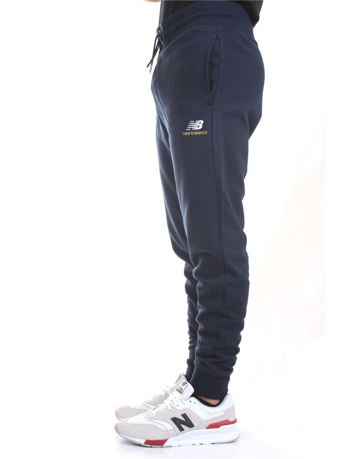 NEW BALANCE MP11590 Blue Clothing Man Trousers