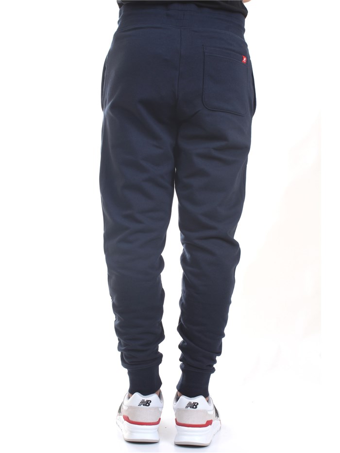 NEW BALANCE MP11590 Blue Clothing Man Trousers